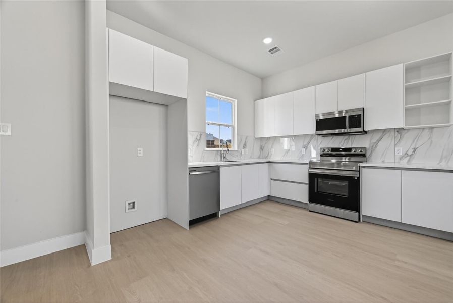 Furnished interior view inside a new home in Metro Village, Houston (Image 15).