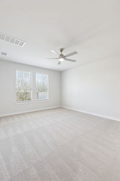 Primary Suite in the Masters home plan by Trophy Signature Homes – REPRESENTATIVE PHOTO