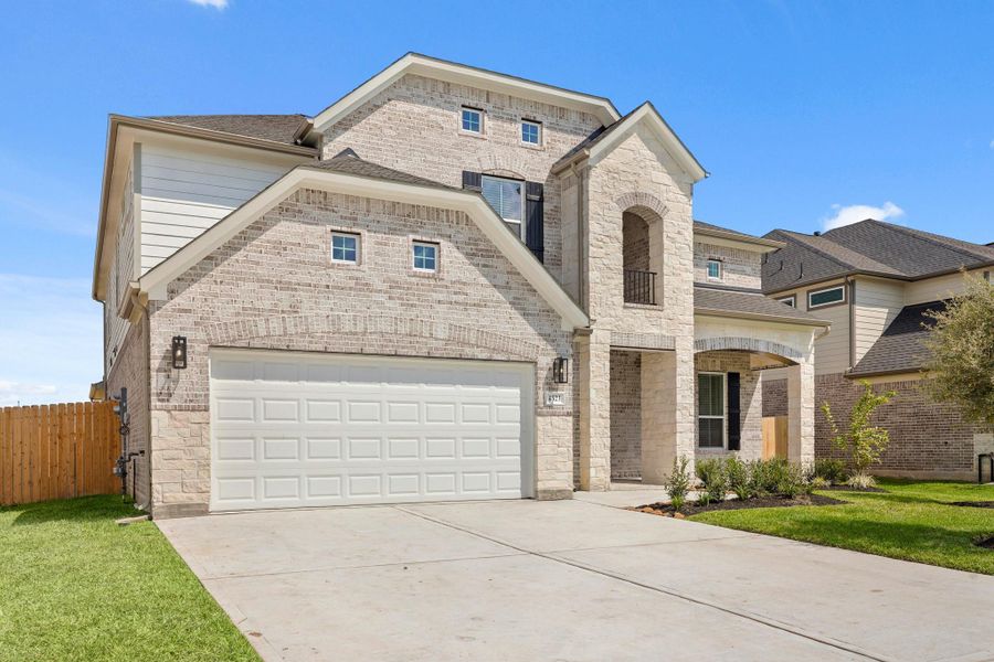 Front exterior of a new home in Briarwood Crossing, Rosenberg, TX, highlighting curb appeal (Image 20).