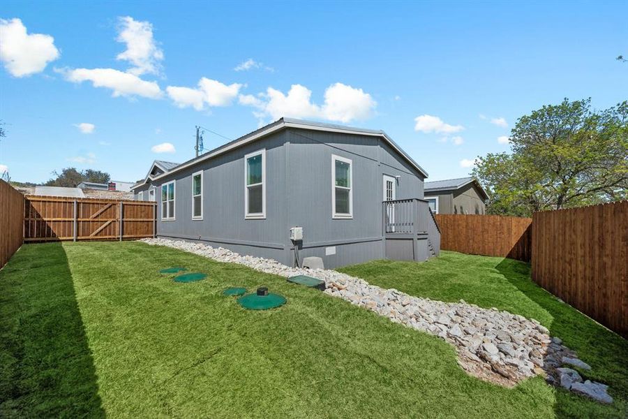 Exterior details and patio area of a home in , Granbury (Image 21). Exterior details and patio area of a home in , Granbury (Image 21).