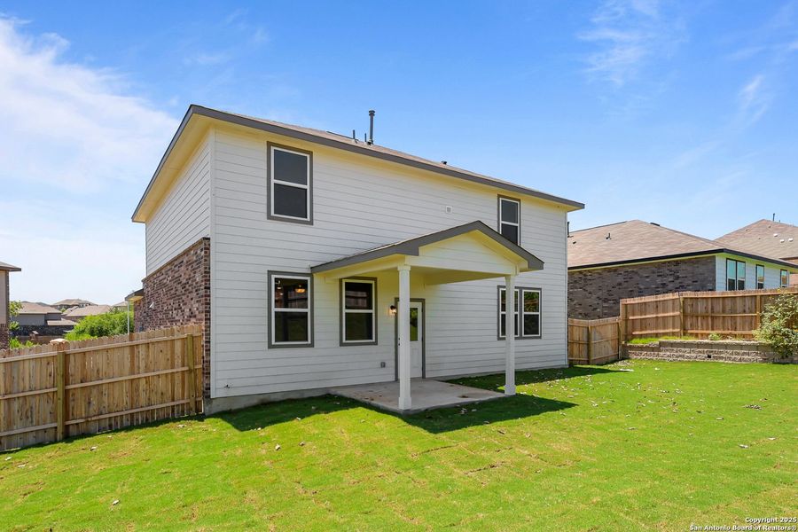 Front exterior of a new home in Comanche Ridge, San Antonio, TX, highlighting curb appeal (Image 48). Front exterior of a new home in Comanche Ridge, San Antonio, TX, highlighting curb appeal (Image 48).
