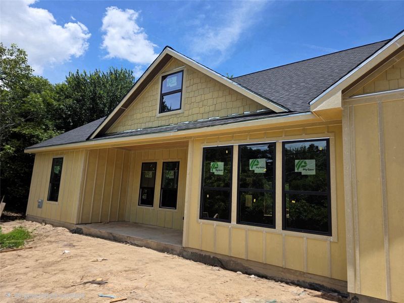 Front elevation with covered porch entry Front elevation with covered porch entry