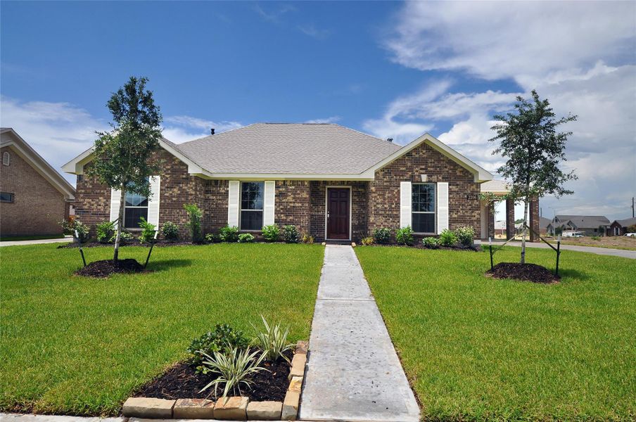 Front exterior of a new home in , League City, TX, highlighting curb appeal (Image 23). Front exterior of a new home in , League City, TX, highlighting curb appeal (Image 23).