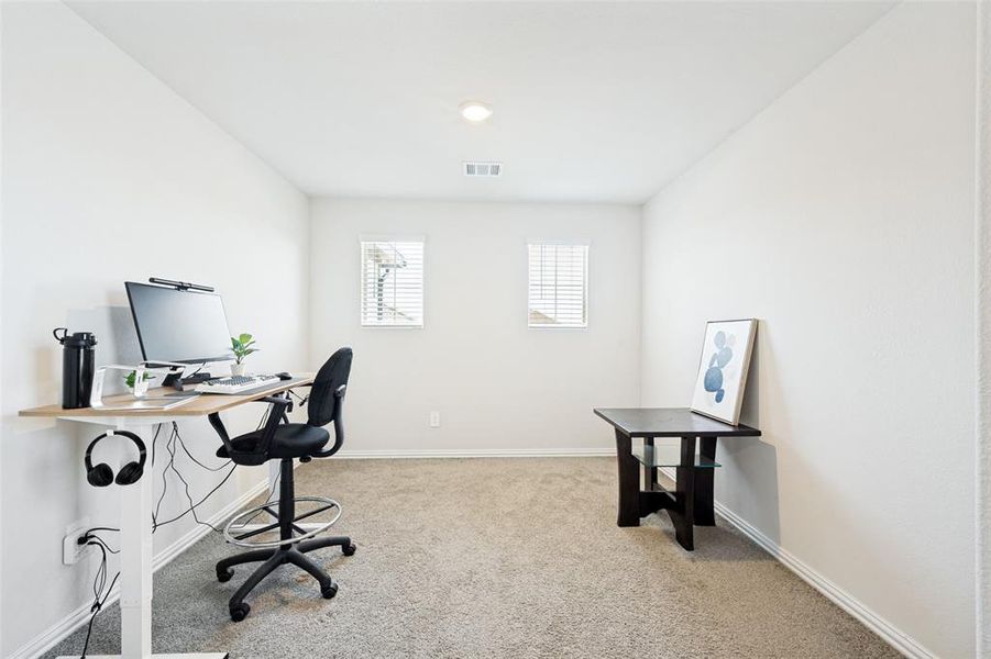 Neutral tone carpet flooring complements crisp white walls Neutral tone carpet flooring complements crisp white walls