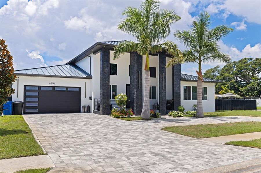 Front exterior of a new home in , St. Petersburg, FL, highlighting curb appeal (Image 22). Front exterior of a new home in , St. Petersburg, FL, highlighting curb appeal (Image 22).