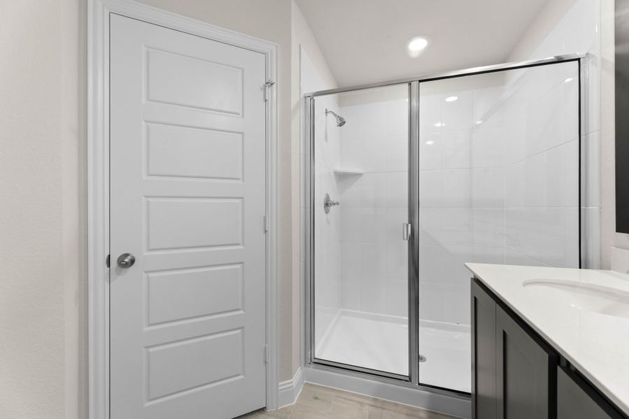 Representative exterior photo of a completed home built from the Whitney by Impression Homes in Timber Ridge, Corinth, TX (Image 18).