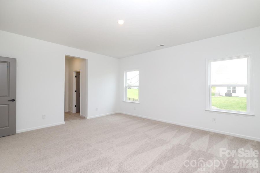 Spacious, unfurnished interior of a new home in Estates at Sugar Creek, Indian Land (Image 43).