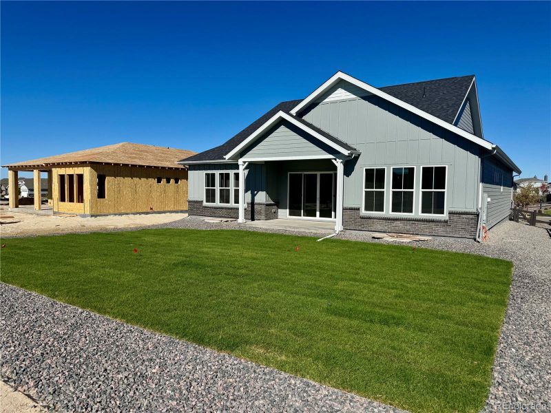 Exterior details and patio area of a home in Hilltop at Inspiration, Aurora (Image 4).