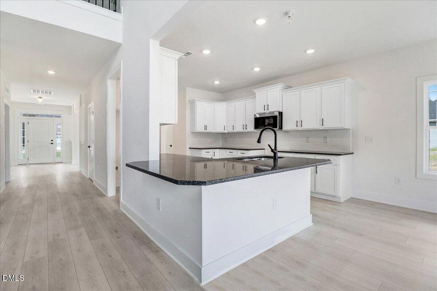 Furnished interior view inside a new home in Hidden Pines, Cameron (Image 5).