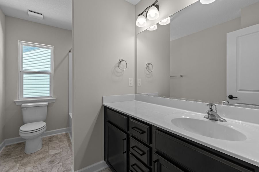 Representative furnished interior of a home built from the The Azalea by Chesapeake Homes in The Farm at Neill's Creek, Lillington (Image 17).