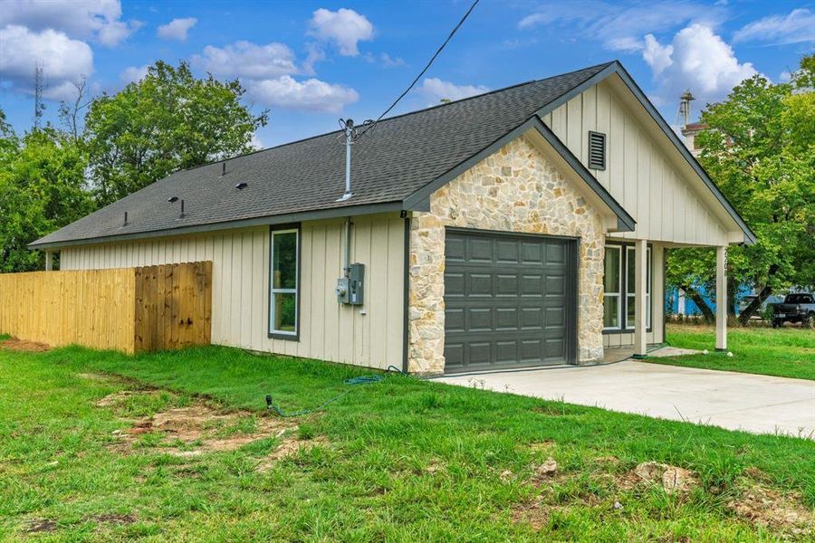 Front exterior of a new home in , Greenville, TX, highlighting curb appeal (Image 21). Front exterior of a new home in , Greenville, TX, highlighting curb appeal (Image 21).