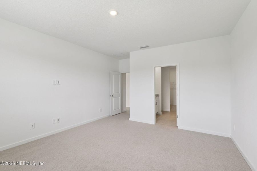 Spacious, unfurnished interior of a new home in Flagler Village - Signature Series, Palm Coast (Image 27).