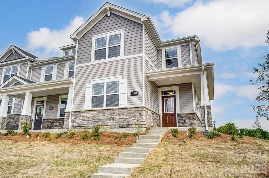 Front exterior of a new home in Cheyney, Charlotte, NC, highlighting curb appeal (Image 24).