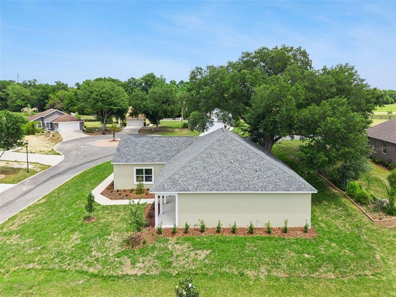 Front exterior of a new home in , Umatilla, FL, highlighting curb appeal (Image 24). Front exterior of a new home in , Umatilla, FL, highlighting curb appeal (Image 24).