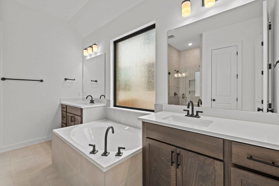 Primary Bath retreat with dual vanities & garden tub Primary Bath retreat with dual vanities & garden tub