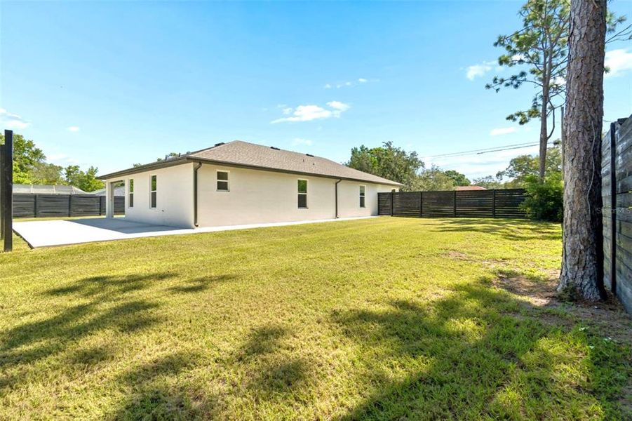 Exterior details and patio area of a home in , Spring Hill (Image 45).