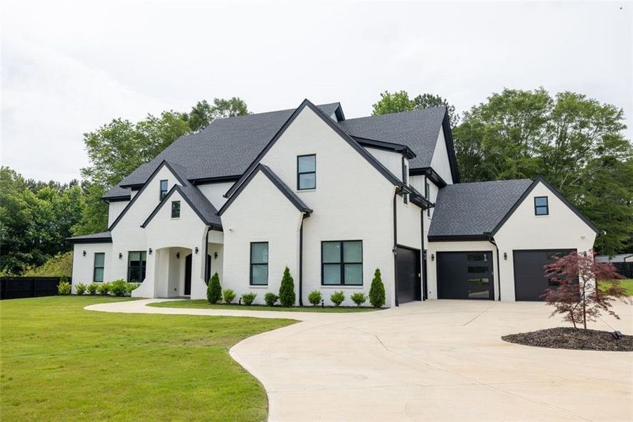 Front exterior of a new home in , Buford, GA, highlighting curb appeal (Image 25).