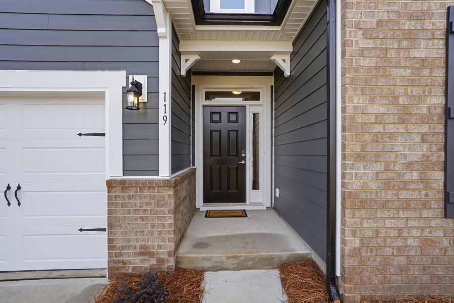 Exterior details and patio area of a home in Villas at Prestwick, Mooresville (Image 3). Exterior details and patio area of a home in Villas at Prestwick, Mooresville (Image 3).