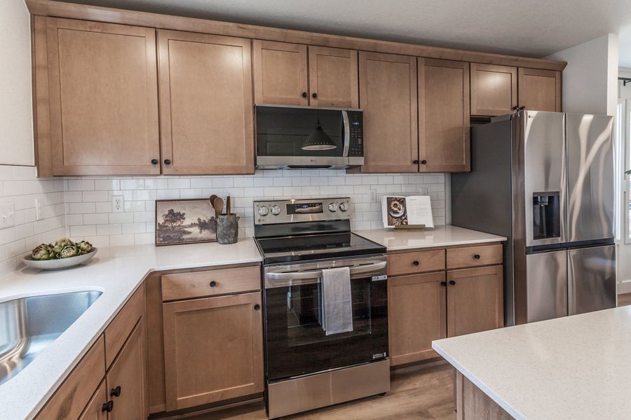 Representative furnished interior of a home built from the Magnolia by Hartford Homes in Prairie Song, Windsor (Image 11).