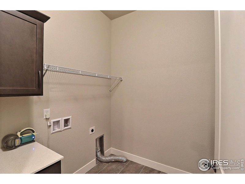 Main Floor Laundry Room with Built-Ins