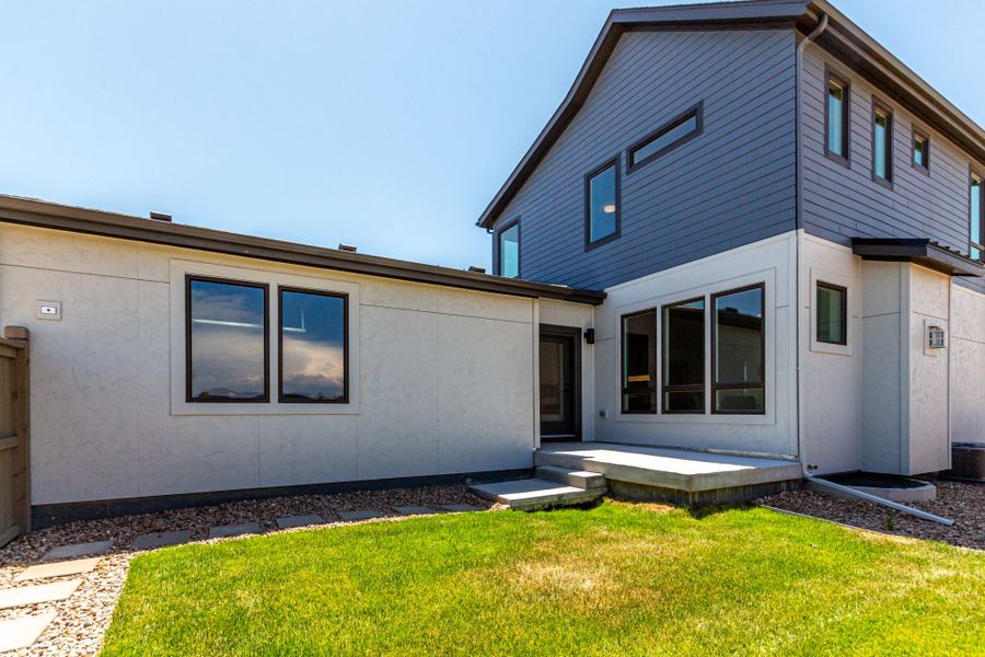 Exterior details and patio area of a home in West Grange, Longmont (Image 4).
