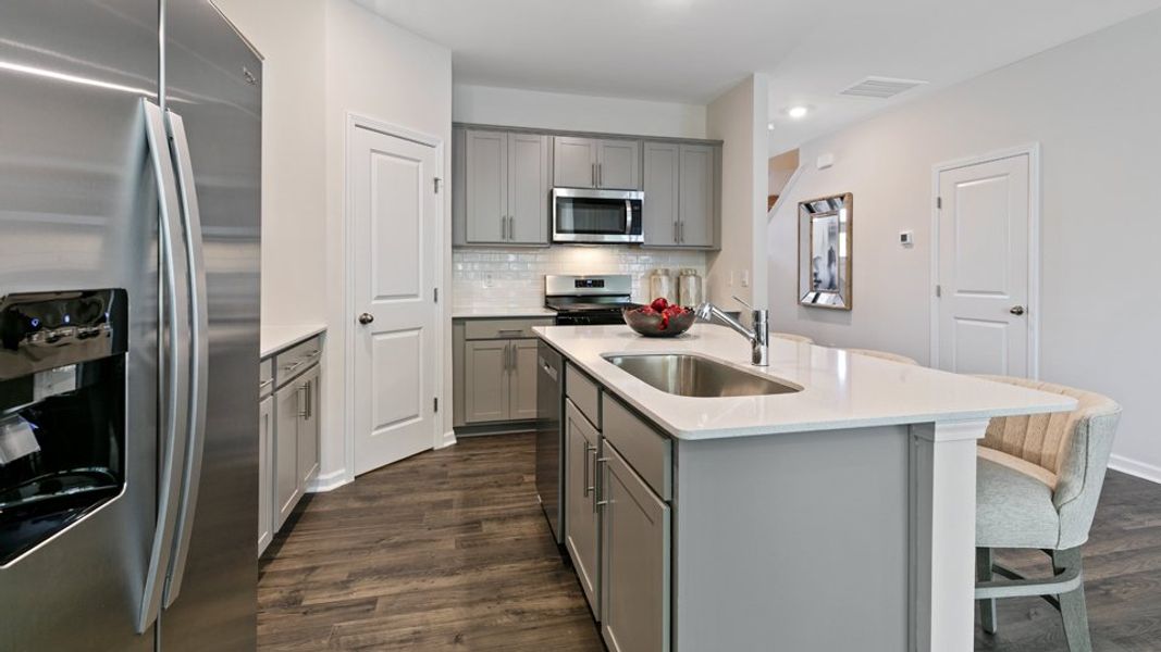 Representative furnished interior of a home built from the DENVER - TRADITIONS by D.R. Horton in Chapel Townes, Raleigh (Image 6).