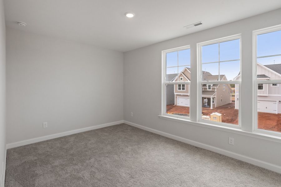 Spacious, unfurnished interior of a new home in Sweetbrier, Durham (Image 31).