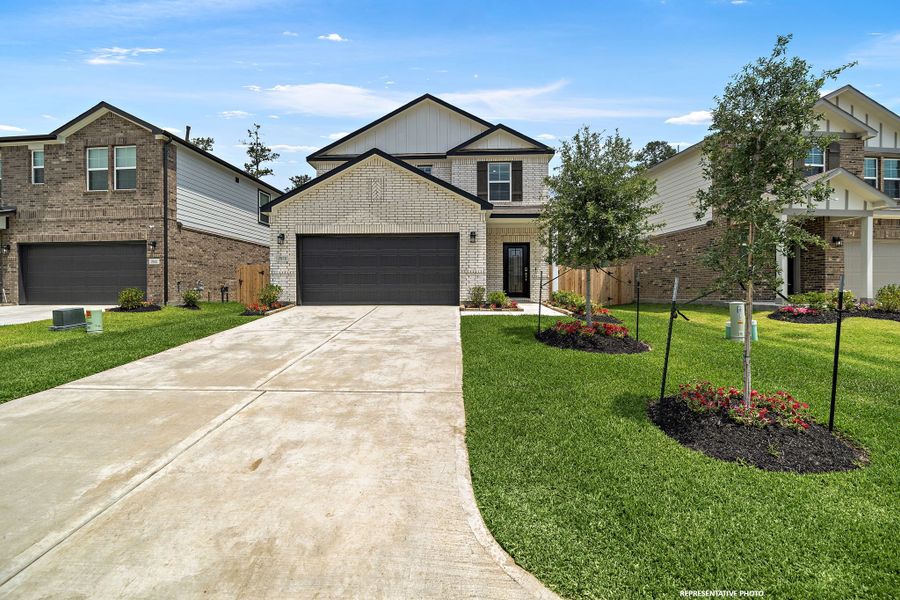 A driveway leading to a house. A driveway leading to a house.