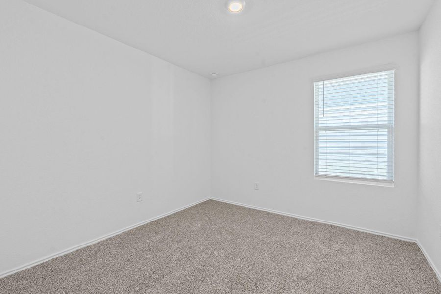 Spare room with carpet flooring and recessed lighting