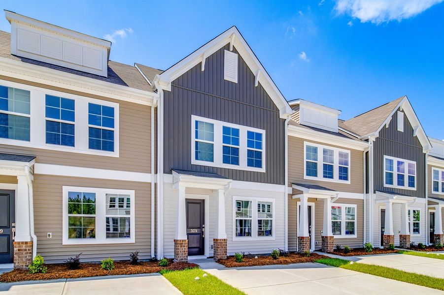 Front exterior of a new home in Astoria, Columbia, SC, highlighting curb appeal (Image 16).
