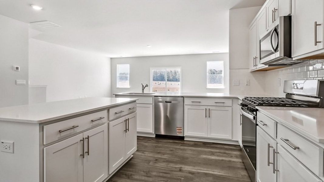 Representative furnished interior of a home built from the HADLEIGH by D.R. Horton in The Townes Park, Apex (Image 8).