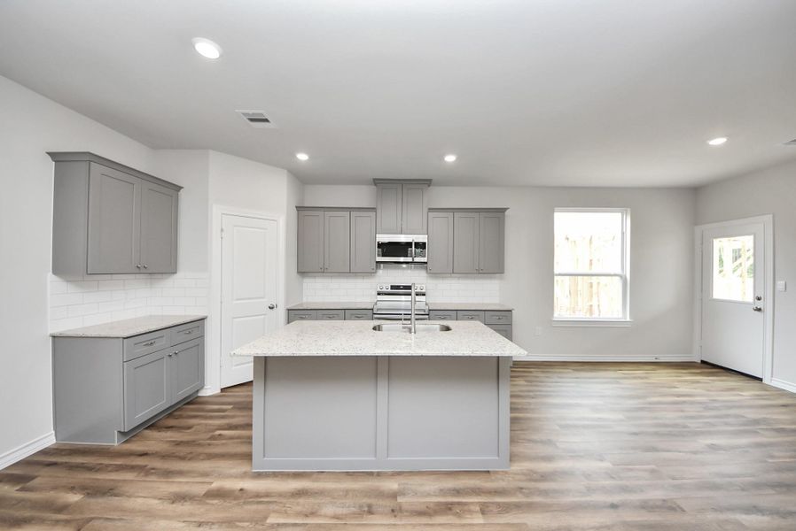 Furnished interior view inside a new home in The Enclave at Spring Branch, Conroe (Image 5).