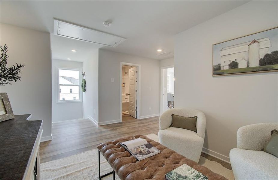 Furnished interior view inside a new home in The Towns at Auburn Station West, Auburn (Image 19).