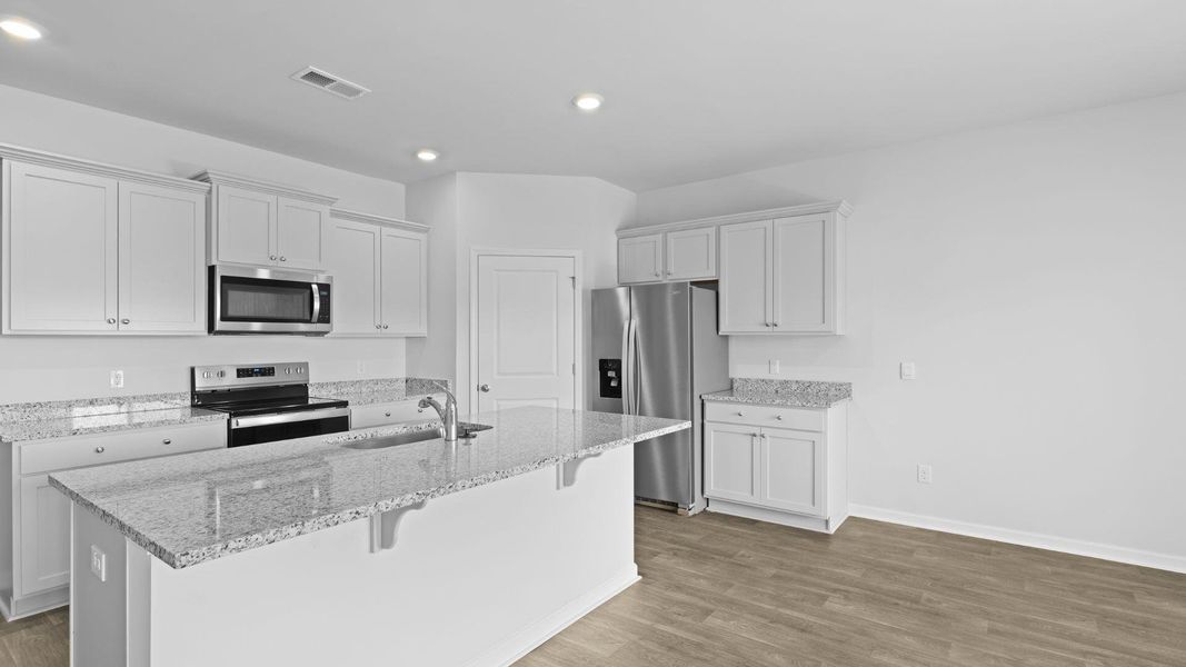 Furnished interior view inside a new home in The Ranch, Holly Hill (Image 5).