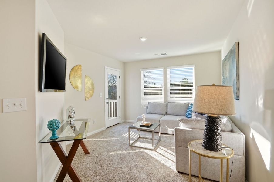 Furnished interior view inside a new home in The Townes at Cheyney, Charlotte (Image 12). Furnished interior view inside a new home in The Townes at Cheyney, Charlotte (Image 12).
