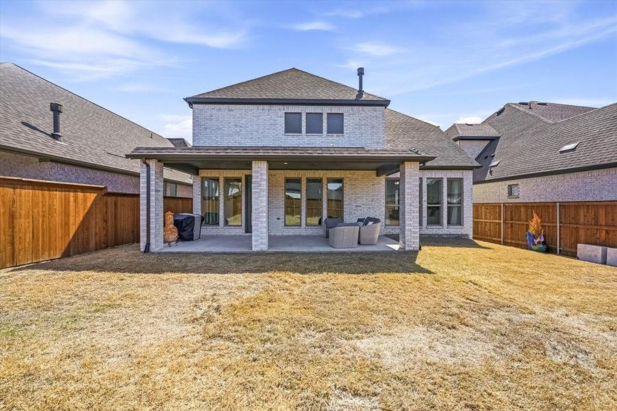 Exterior details and patio area of a home in Mustang Lakes, Celina (Image 24).