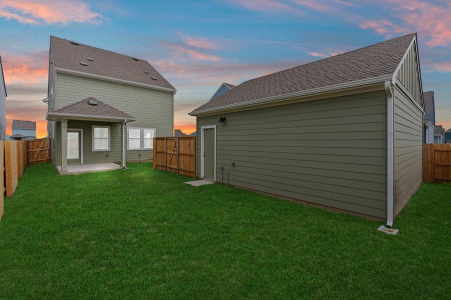 Rear of Home and Private Backyard