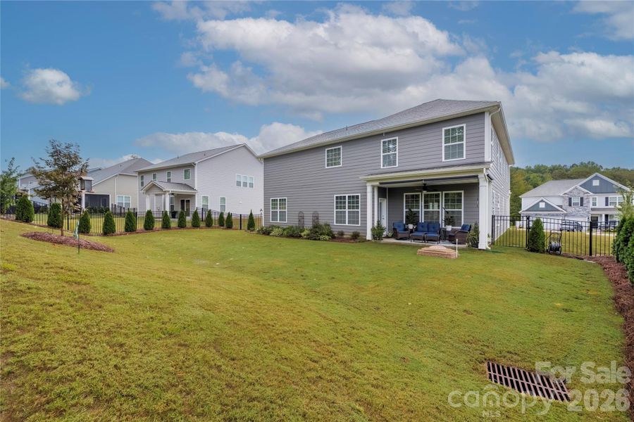 Exterior details and patio area of a home in , Troutman (Image 26).
