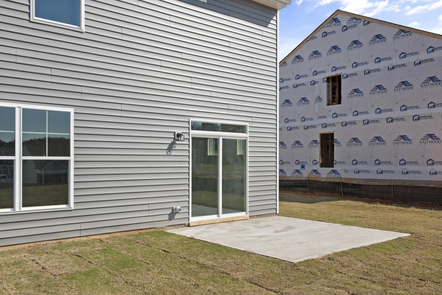 Exterior details and patio area of a home in Oakley Pointe, Moncks Corner (Image 2).