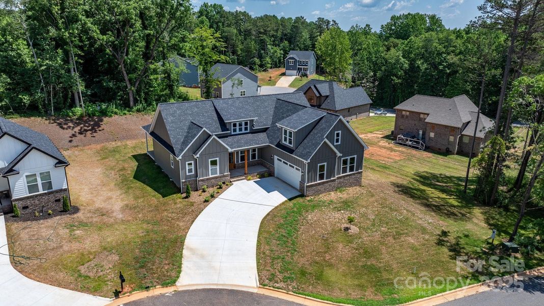 Front exterior of a new home in , Hickory, NC, highlighting curb appeal (Image 23).
