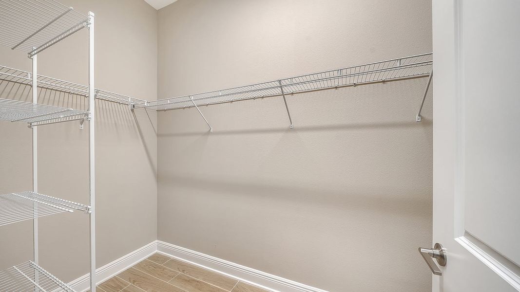 Spacious, unfurnished interior of a new home in Grand Park Real Estate and Homes for Sale in Sarasota, FL - Neal Communities, Sarasota (Image 34). Spacious, unfurnished interior of a new home in Grand Park Real Estate and Homes for Sale in Sarasota, FL - Neal Communities, Sarasota (Image 34).