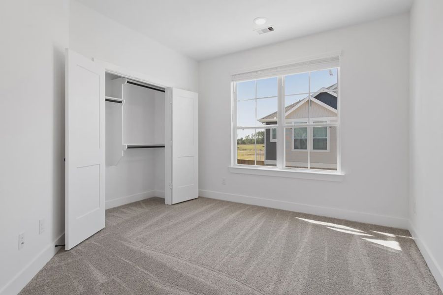Representative unfurnished interior of a home built from the Dillon by Chesmar Homes in Sienna Courtyard, Missouri City (Image 33).