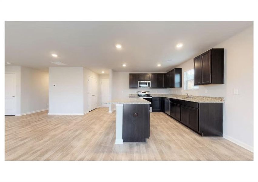 Furnished interior view inside a new home in Crossvine Village, LaGrange (Image 4).