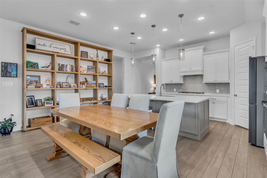Kitchen and dining combo with open concept