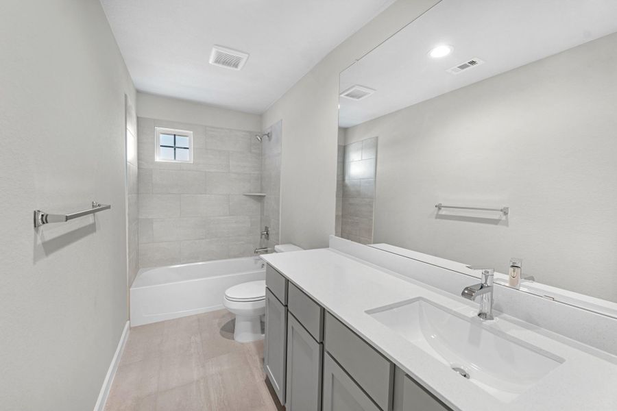 Furnished interior view inside a new home in Sunterra Lakes, Fulshear (Image 5).