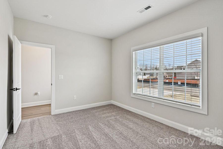 Spacious, unfurnished interior of a new home in Colonial Crossing, Troutman (Image 16).