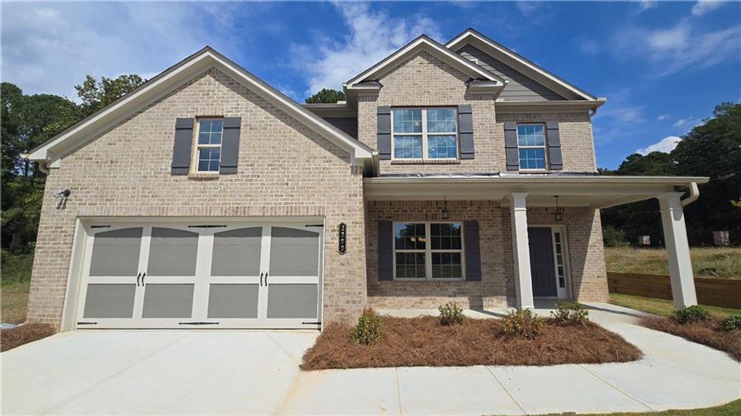Front exterior of a new home in , Grayson, GA, highlighting curb appeal (Image 1). Front exterior of a new home in , Grayson, GA, highlighting curb appeal (Image 1).