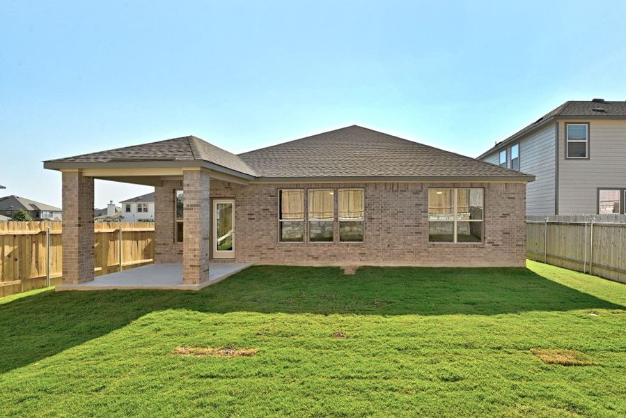 Exterior details and patio area of a home in McKinney Crossing, Austin (Image 22). Exterior details and patio area of a home in McKinney Crossing, Austin (Image 22).