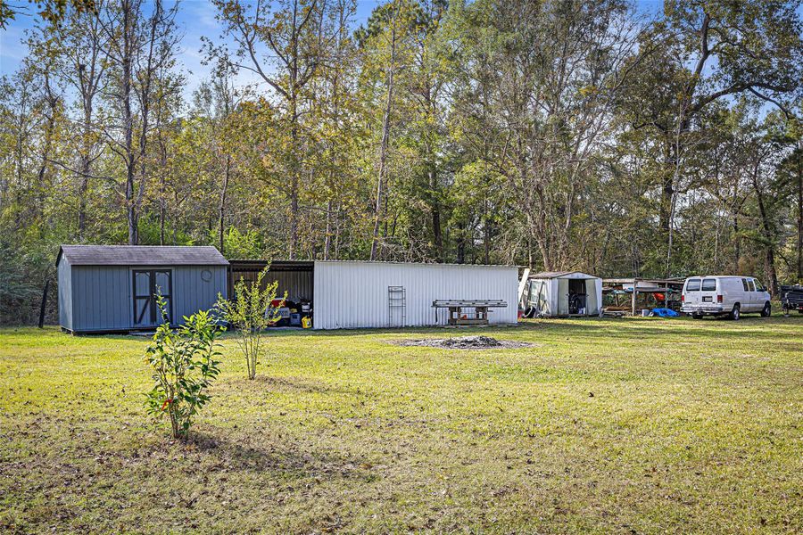 Exterior details and patio area of a home in , Splendora (Image 19). Exterior details and patio area of a home in , Splendora (Image 19).