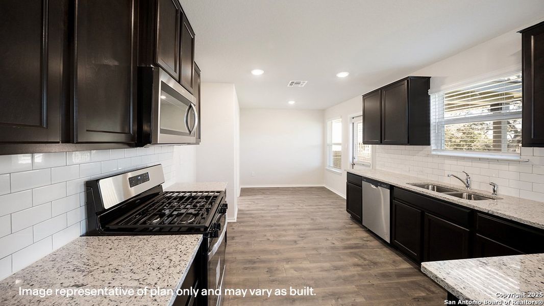 Furnished interior view inside a new home in Brookstone Creek, San Antonio (Image 6).